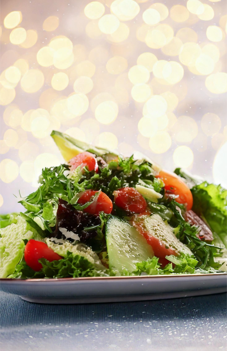 a salad with lettuce and tomatoes